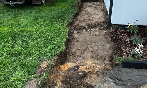 Niwelacja terenu pod kostkę brukową